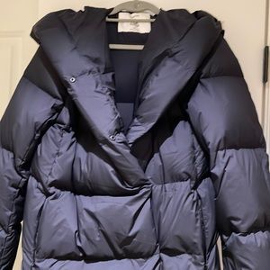 Black 3/4 length puffer coat.